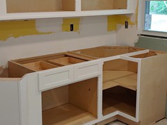2" deep lower buffet cabinets were held off the wall 2" to give home owner a deeper countertop